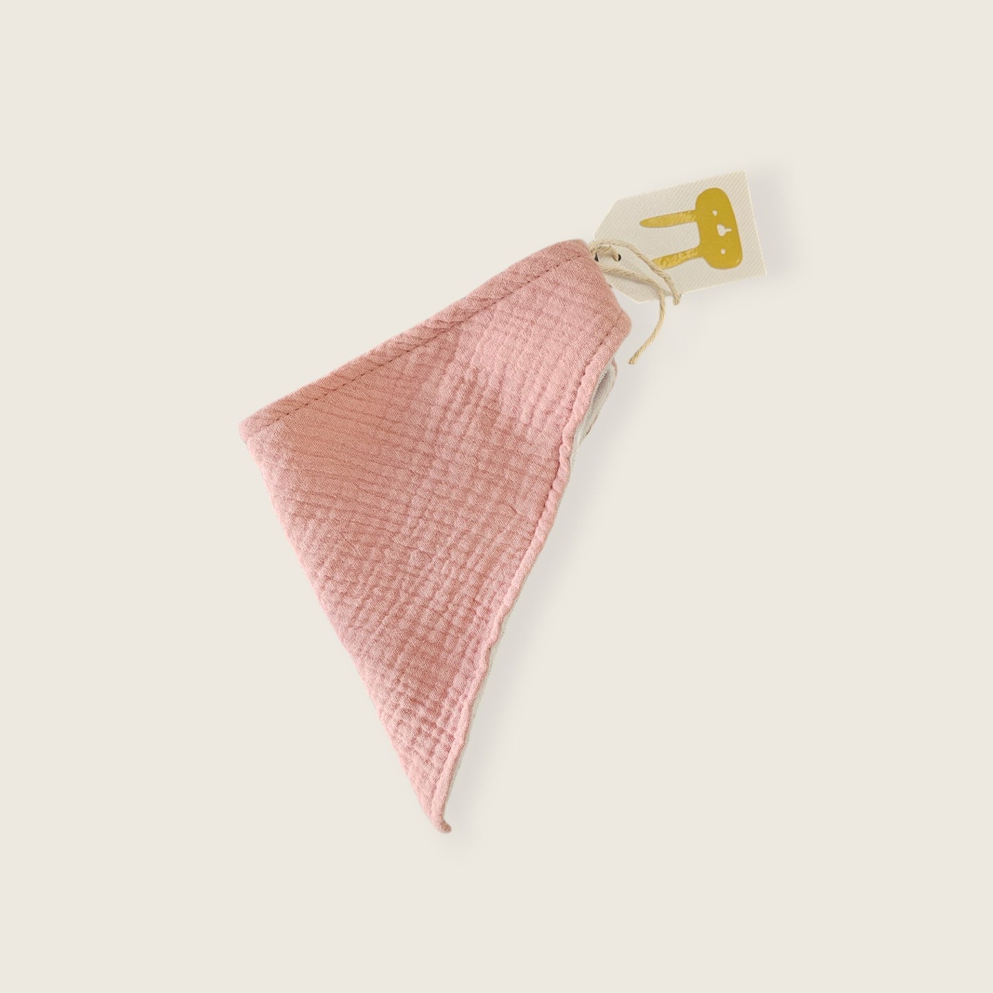 Babero rosa de muselina