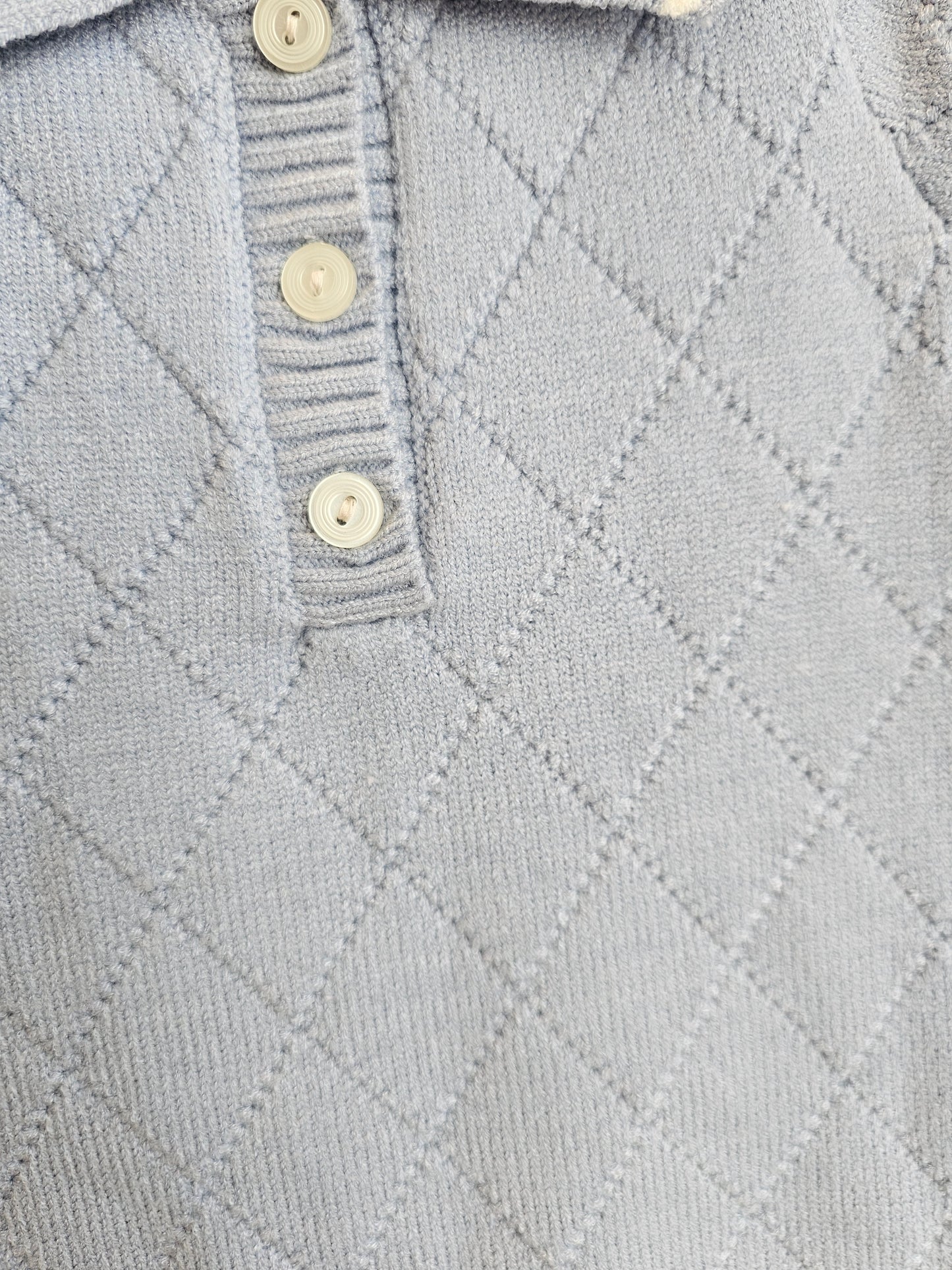 Mono de punto de rombos azul