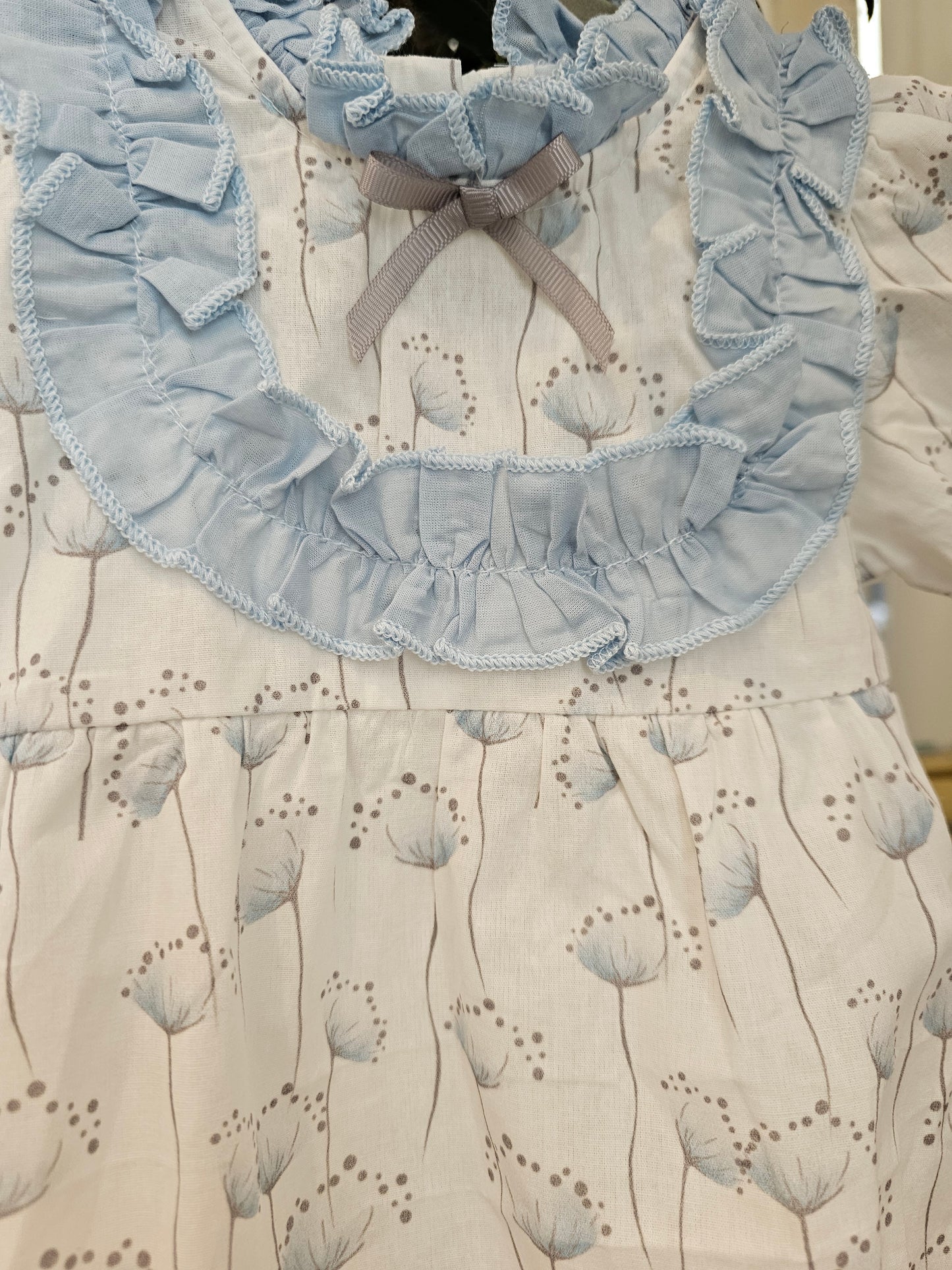 Body Flores y olan cuello azul