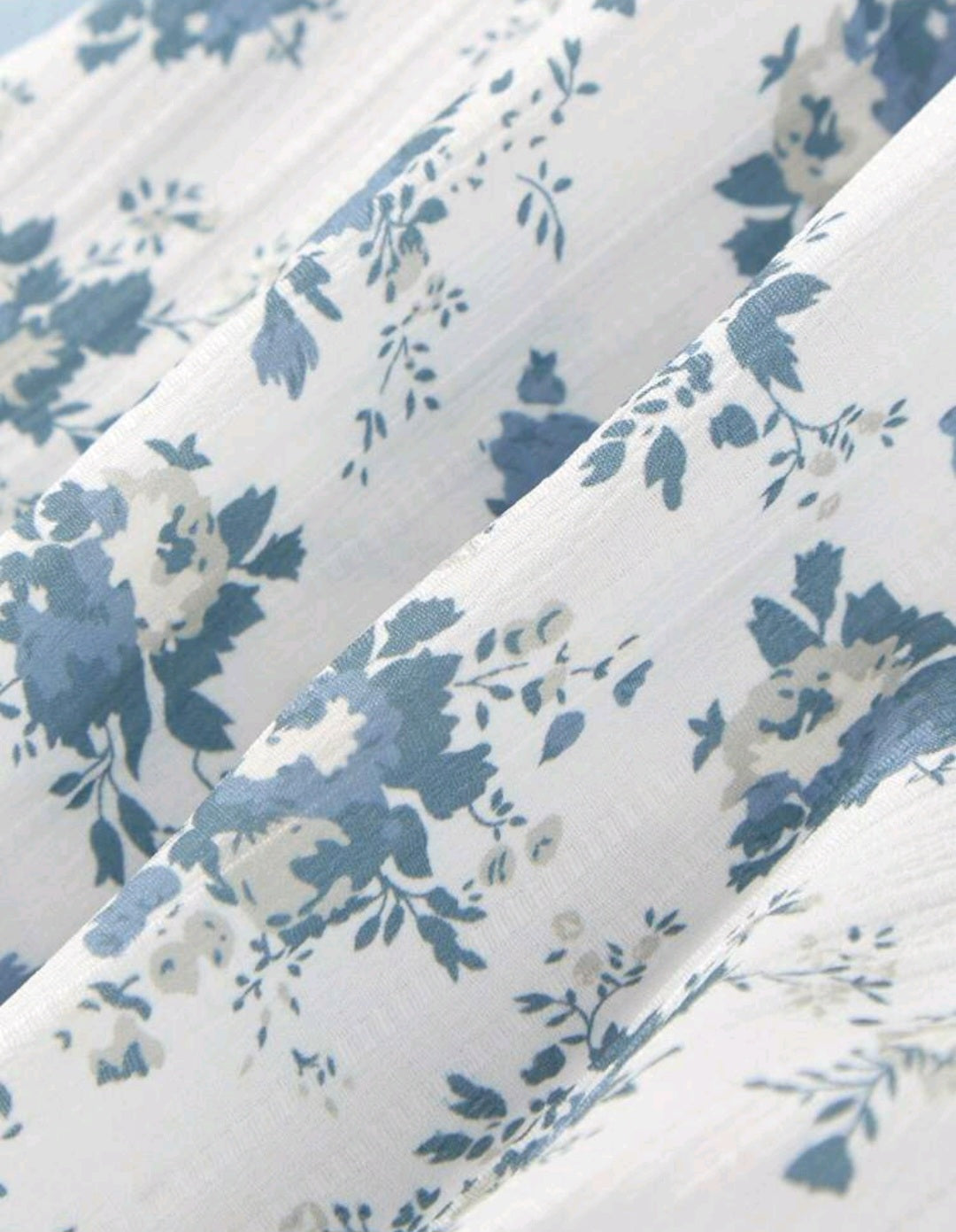 Body floral con peto azul