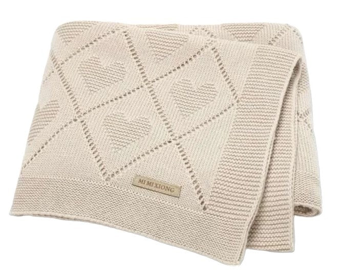 Manta con diseño de corazones