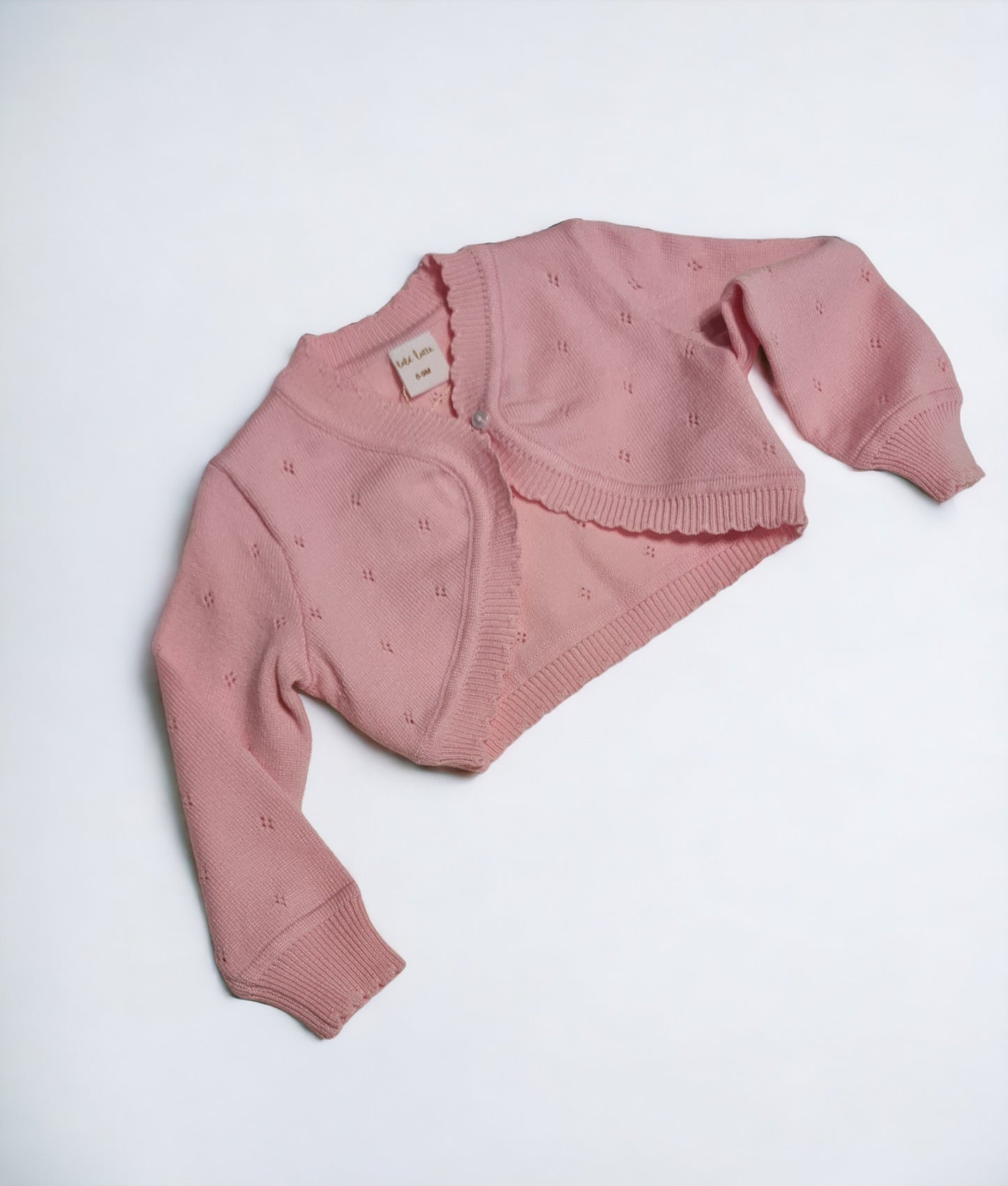 Cárdigan rosa con botón delantero