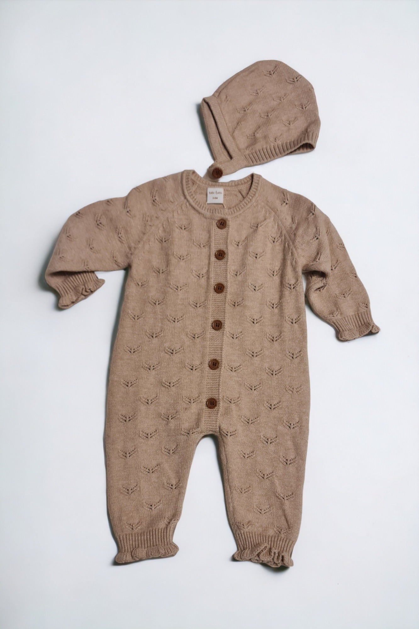 Mameluco con gorro tejido