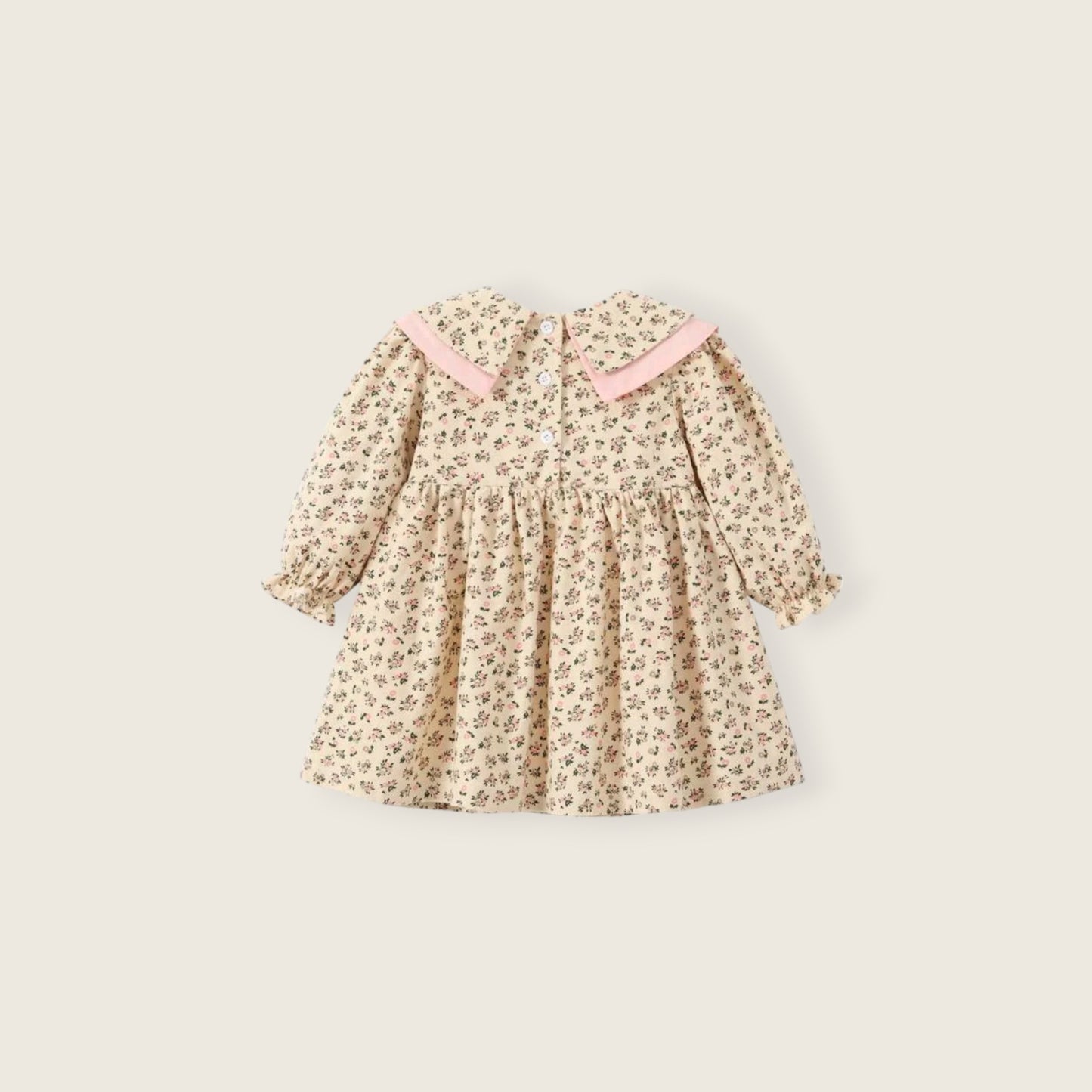 Vestido floral con cuello moño