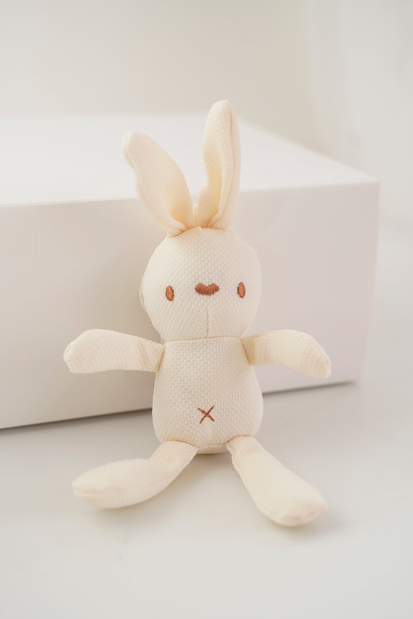 Mini conejo de peluche