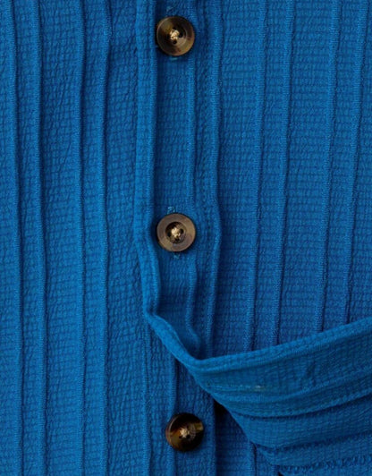 Conjunto azul botón café